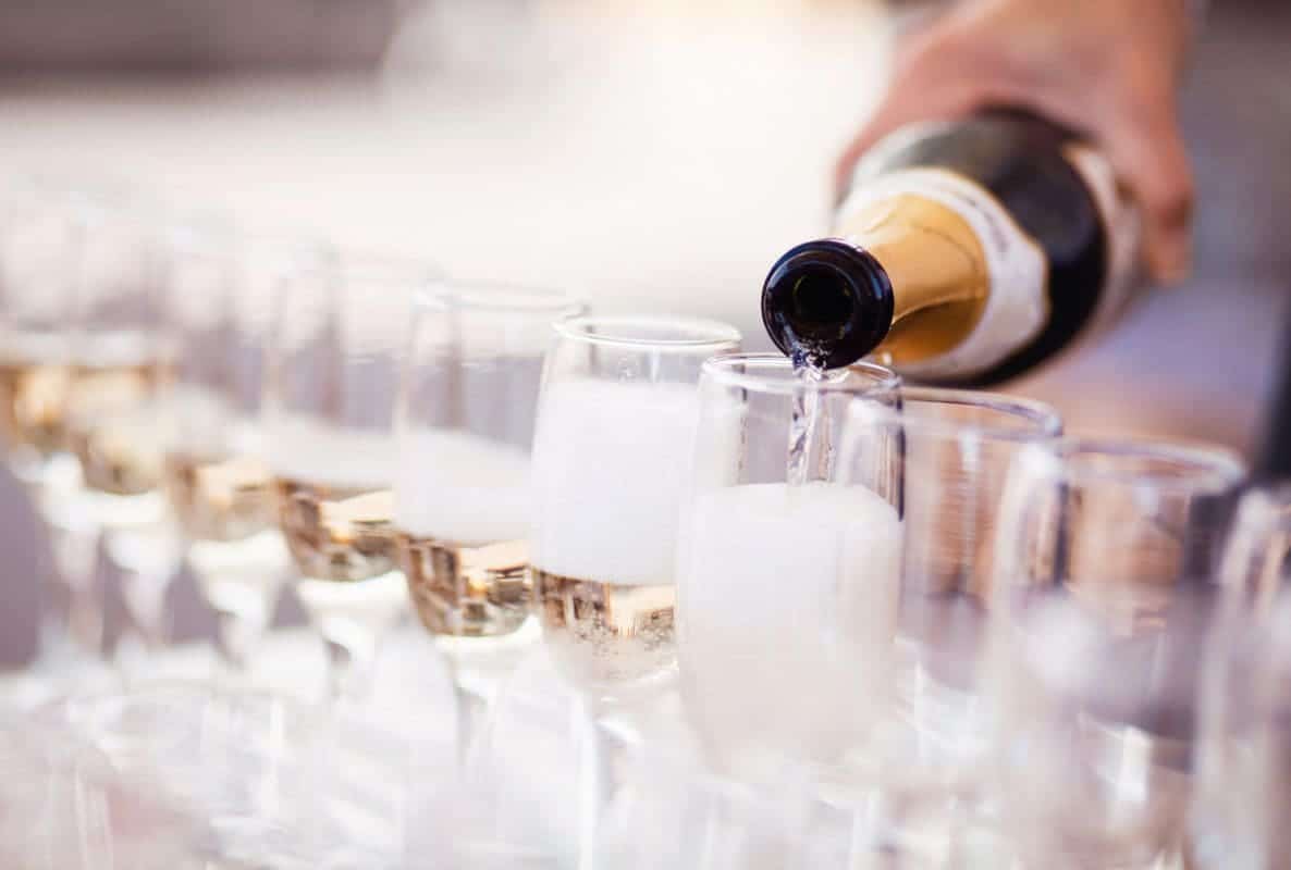 Champagne being poured at a wedding